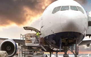 loading cargo into the aircraft before departure