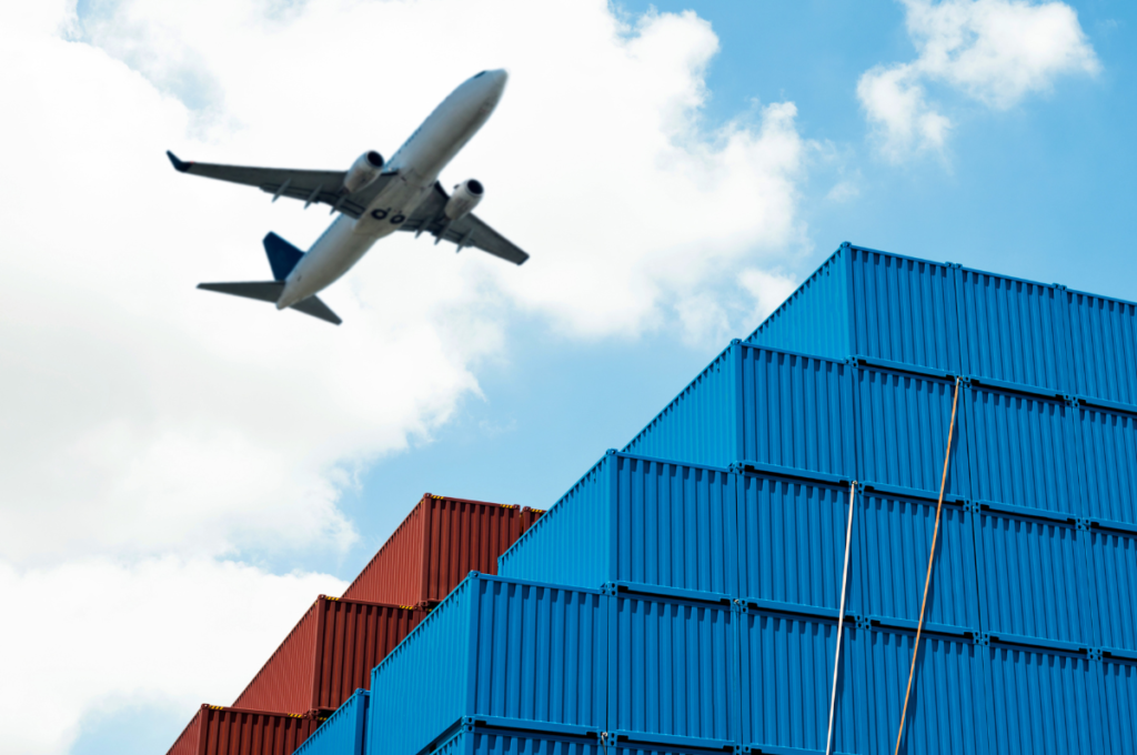 Cargo Plane above shipping containers