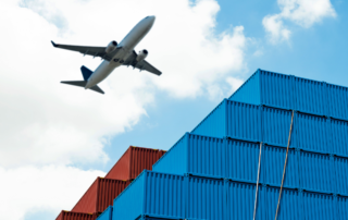 Cargo Plane above shipping containers